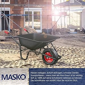 eine Schubkarre mit einer roten Schubkarre